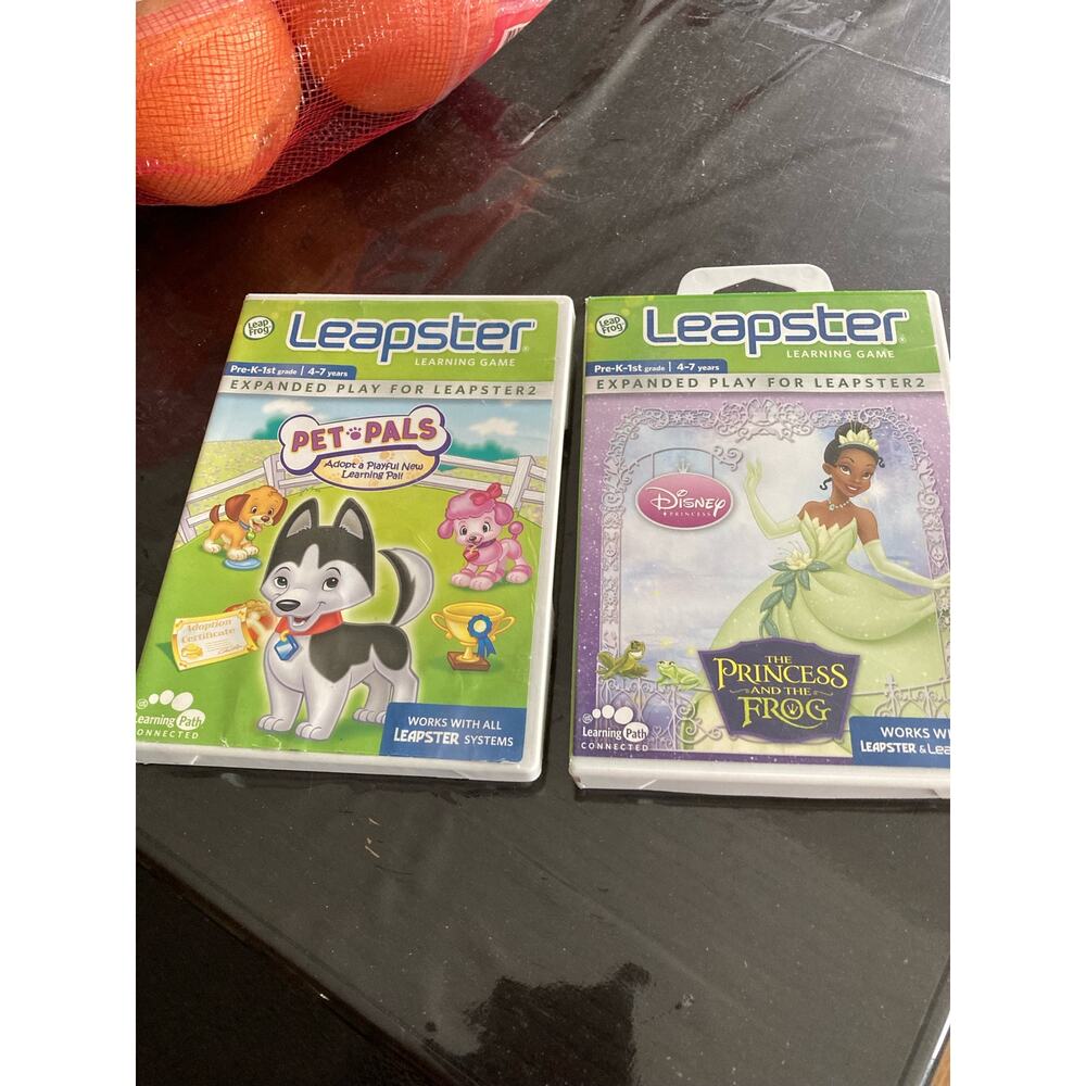 Lot of 2 leapfrog leapster learning game pet pal, the princess and the frog